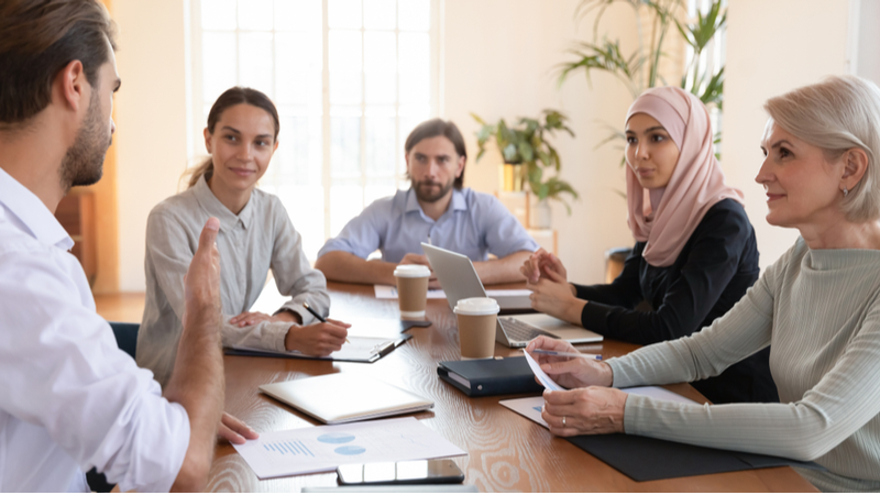 Diverse coworkers discussing business issues